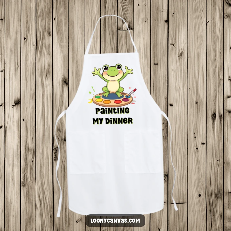 Funny joyful frog character jumping into a paint palette, this apron is a funny gift for messy creators.