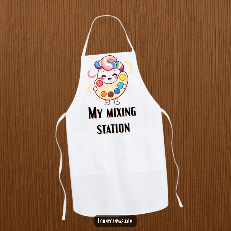 Smiling palette character holding a vibrant swirl of colors, embroidered on a functional apron.