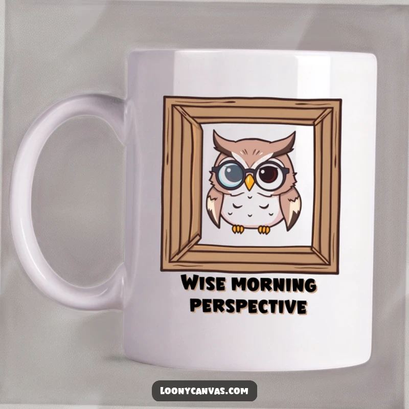Funny mug featuring a determined owl with a monocle intently examining a crooked picture frame, seeking flawlessness.