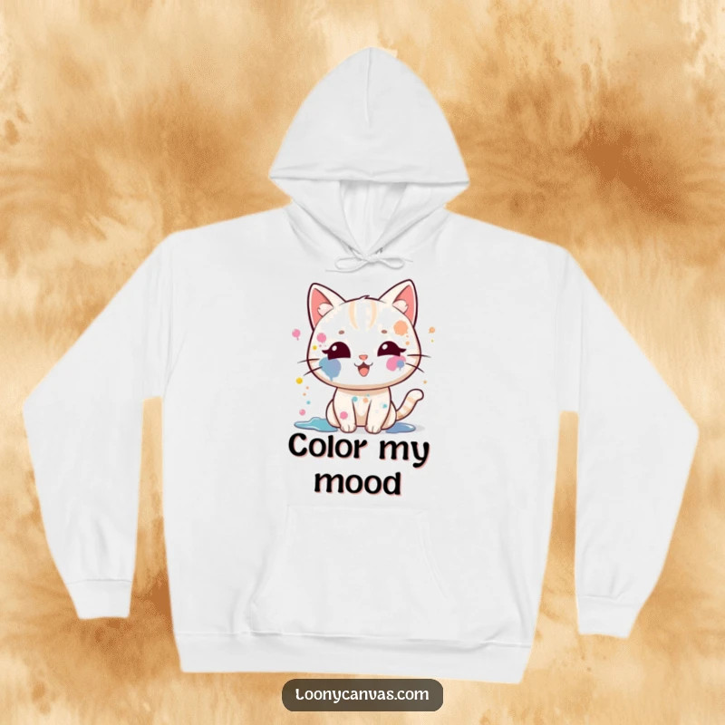 Funny kawaii cat hoodie, a cat covered in paint splatters, joyfully splattering more paint, symbolizing creative expression.