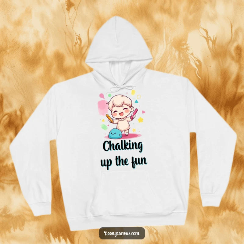 Funny hoodie showing a gleeful character creating abstract shapes with colorful chalk, ideal for art enthusiasts and free spirits.