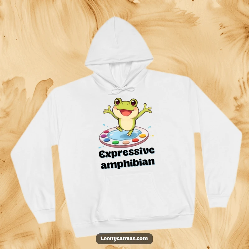 Funny Frog Hoodie: A happy frog character mid-jump into a bright paint palette, showcasing artistic passion.