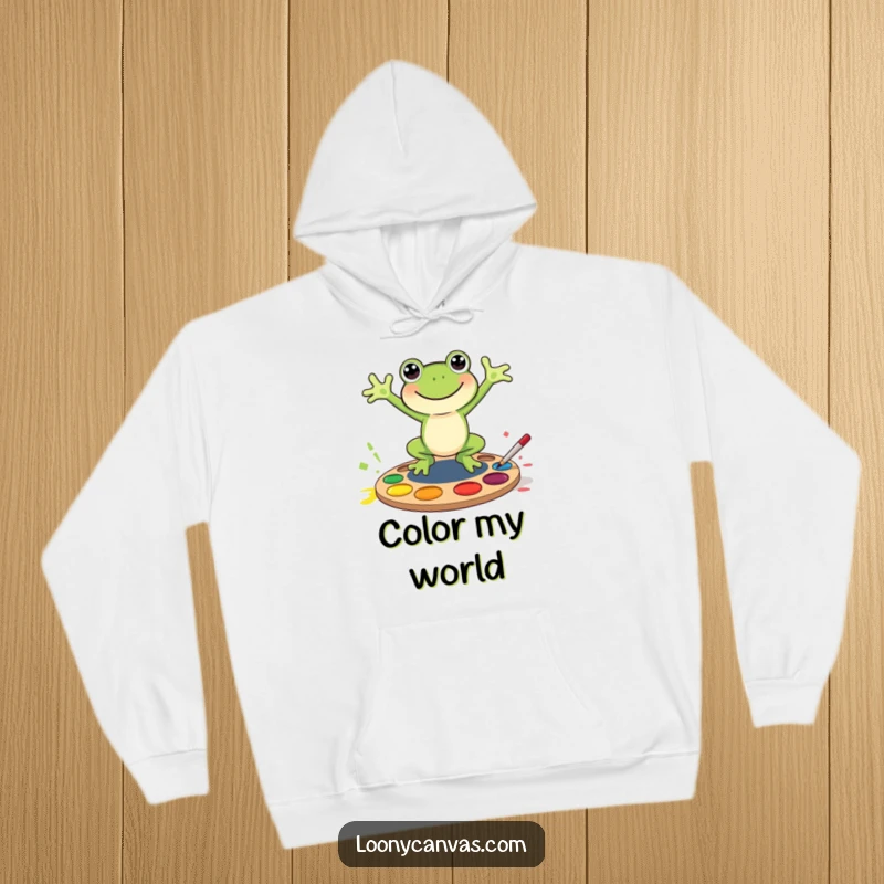 Funny joyful frog character jumping into a paint palette, this hoodie is a warm and funny gift for creators.