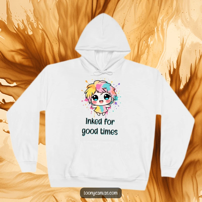 Funny delighted ink blot character splashes with vibrant colors, featured on a warm hoodie for cozy creativity.