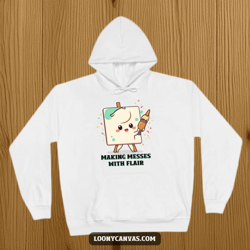 Funny Kawaii paintbrush character, determined to paint a splattered canvas, a warm and humorous hoodie for art lovers.