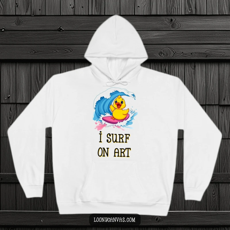 Funny kawaii excited rubber ducky surfing a vibrant paint wave on a cozy hoodie, a humorous and artistic gift.