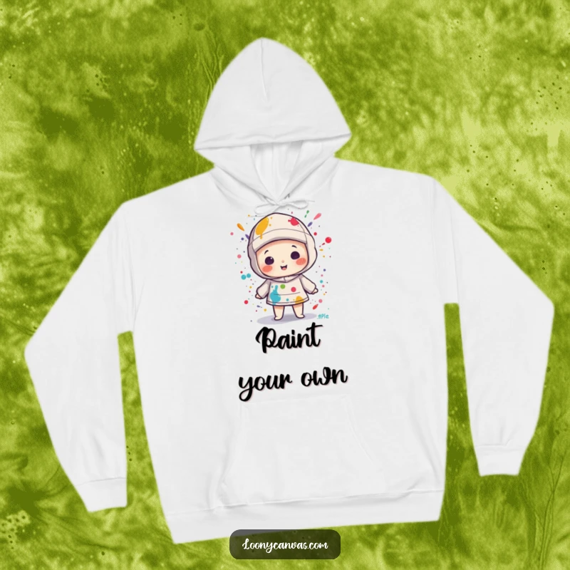 Funny kawaii canvas character playfully splattered with paint, printed on a soft hoodie, embodying artistic fun.