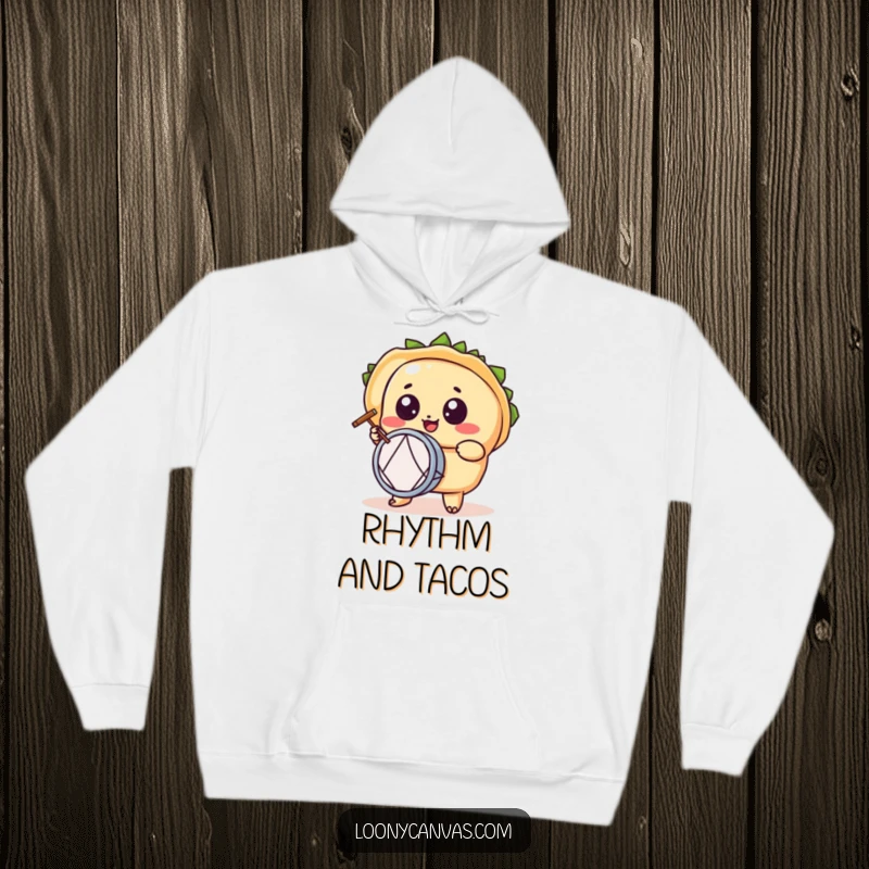 Funny kawaii taco character hoodie, a wide-eyed taco playing a tiny drum with gusto, symbolizing festive comfort.