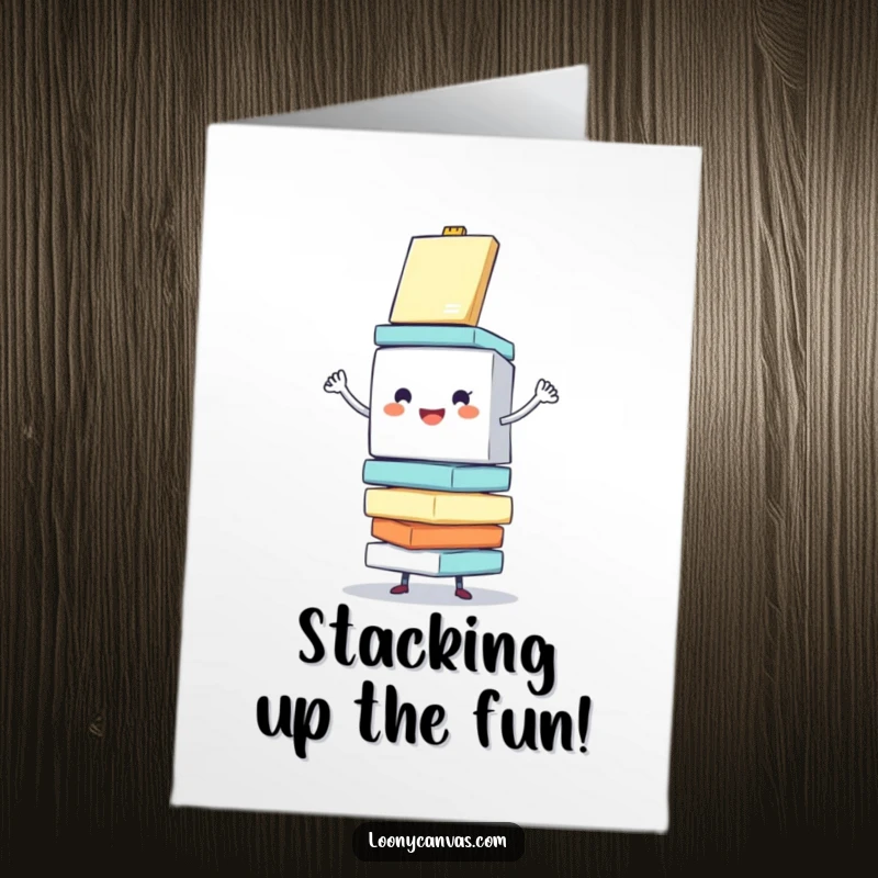 Funny free printable birthday card: a cheerful cube character enthusiastically balancing a stack of wobbling canvases.