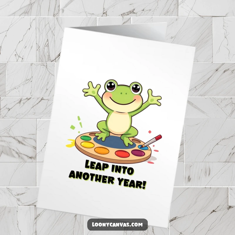 Funny Free Printable Birthday Card: A joyful frog leaps headfirst into a vibrant paint palette, ready to party.