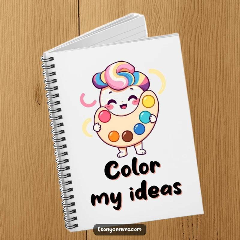 Smiling palette character holding a vibrant swirl of colors on the cover of a notebook.