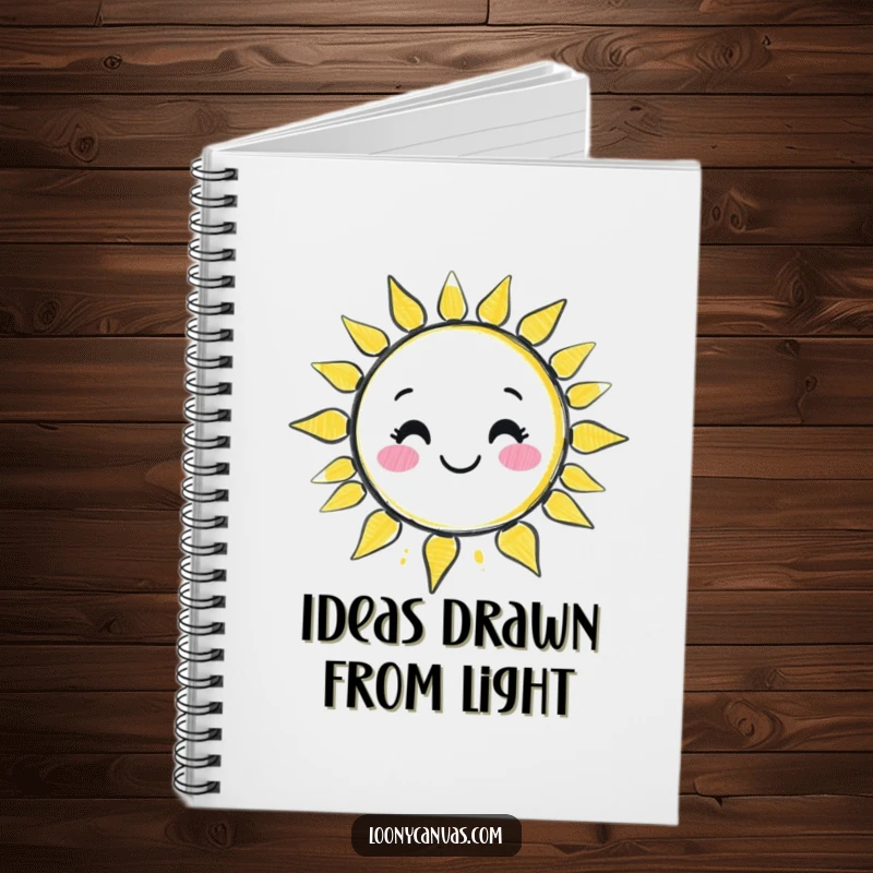 Funny kawaii chalk character drawing a wobbly, smiling sun on the cover of a lined notebook, ready for bright ideas.