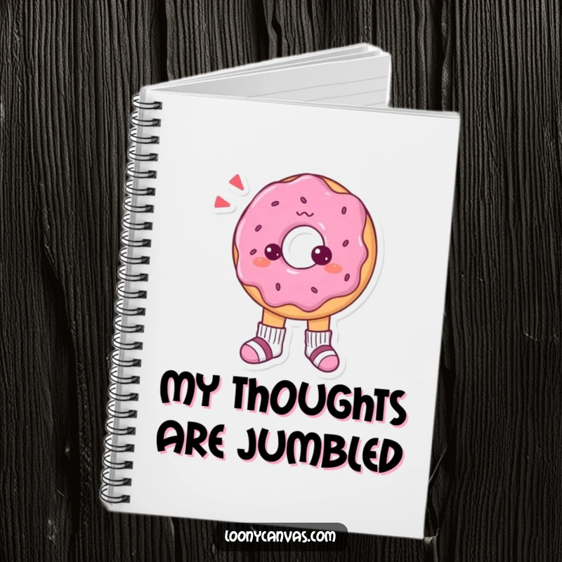 Funny notebook with a confused donut character pondering its tiny mismatched socks, ready to capture quirky ideas.