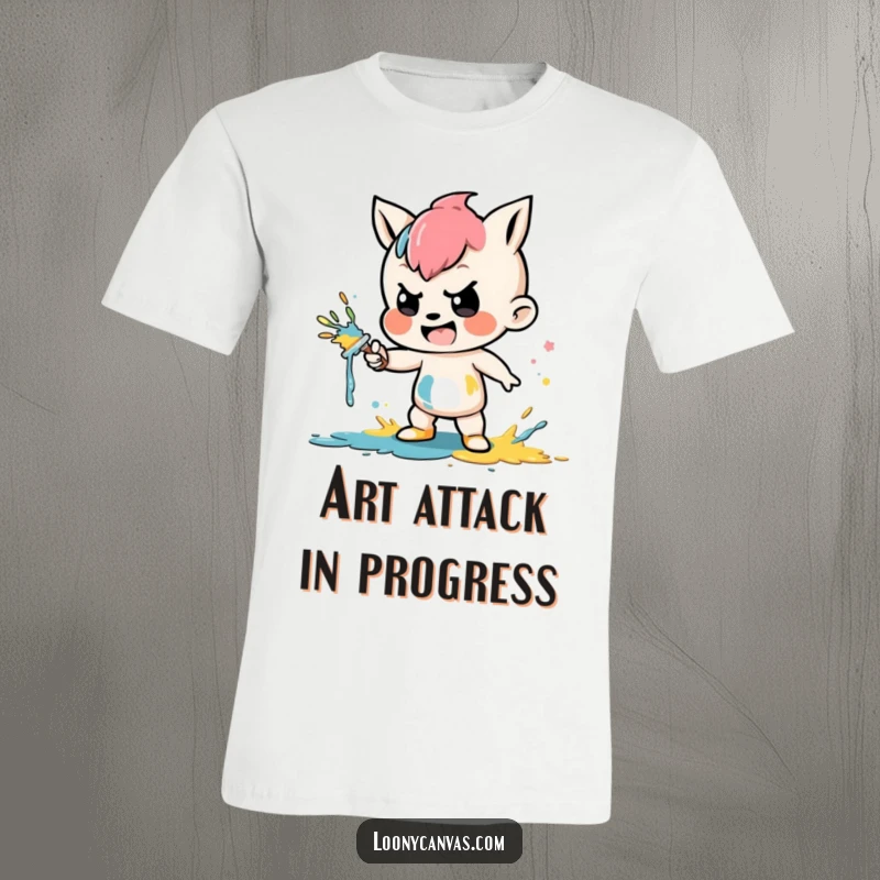 Funny t-shirt with a mischievous character joyfully splattering colorful paint, celebrating messy artistic expression.