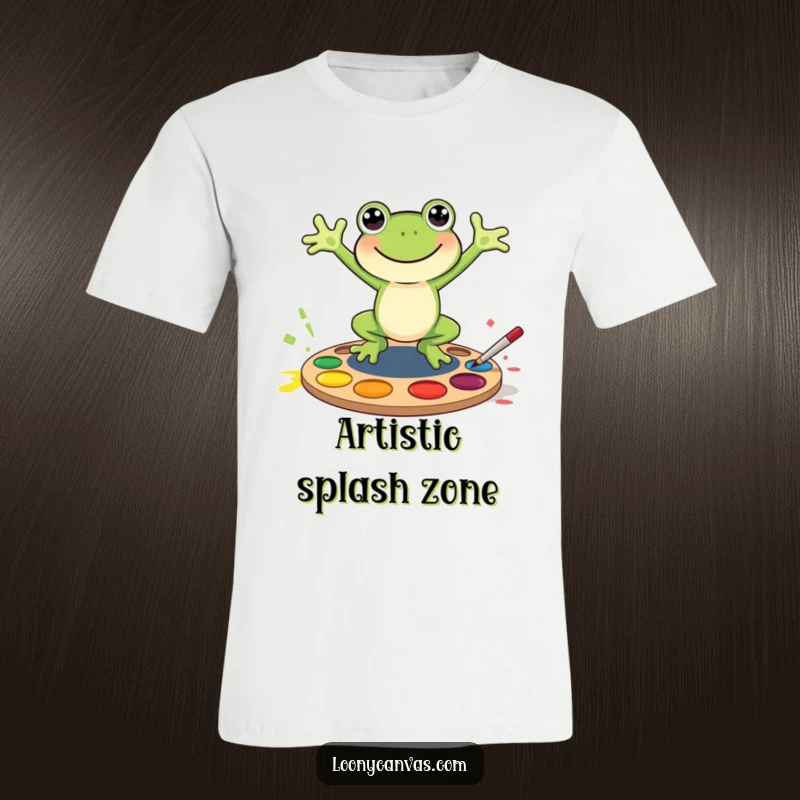 Funny joyful frog character leaping into a paint palette, this t-shirt is a vibrant and funny gift for artists.