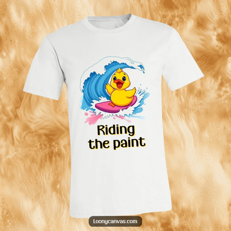 Funny kawaii excited rubber ducky riding a vibrant paint wave on a t-shirt, great for artists and as a funny gift.
