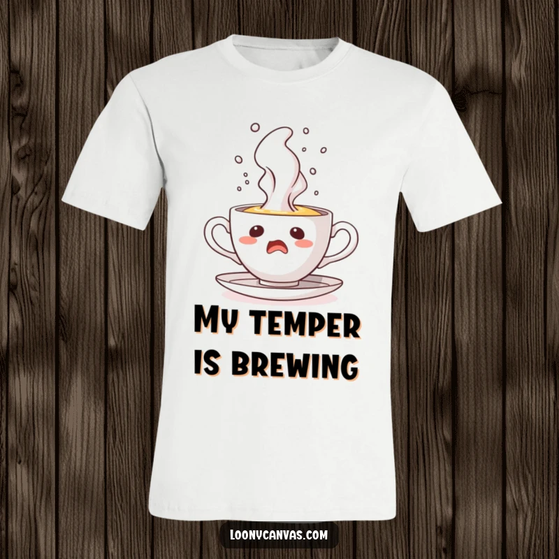 Funny t-shirt with a startled teacup character erupting steam like a geyser, conveying a moment of comical shock and energy.