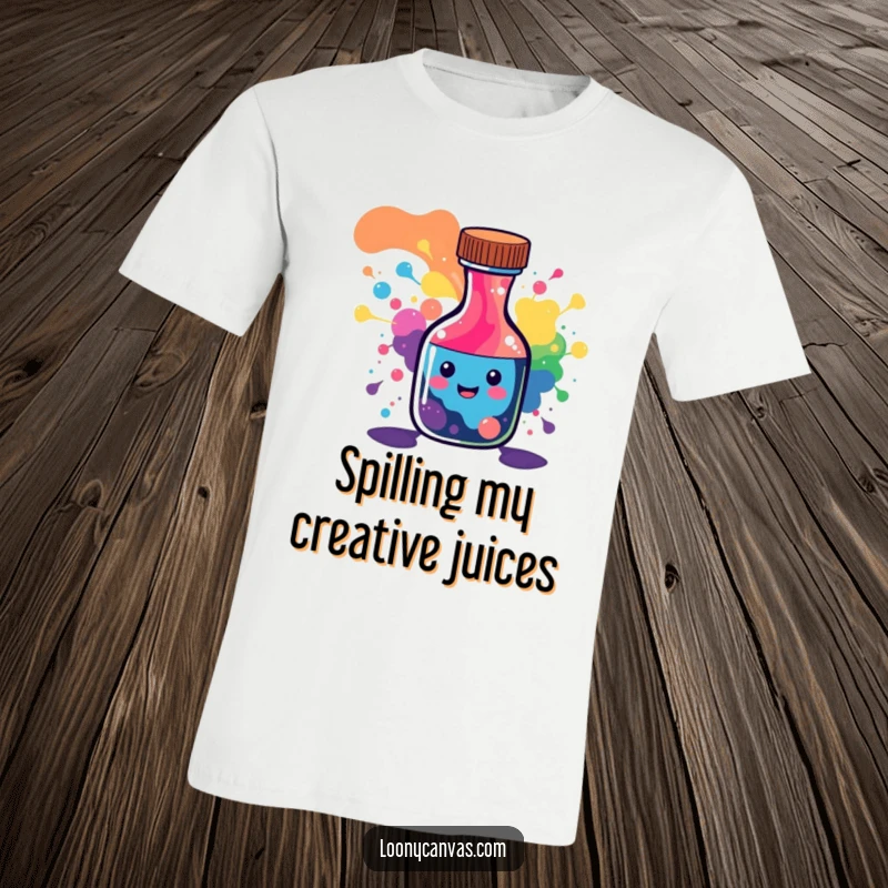 Funny t-shirt featuring a joyful ink bottle character spilling a vibrant explosion of abstract colorful patterns.