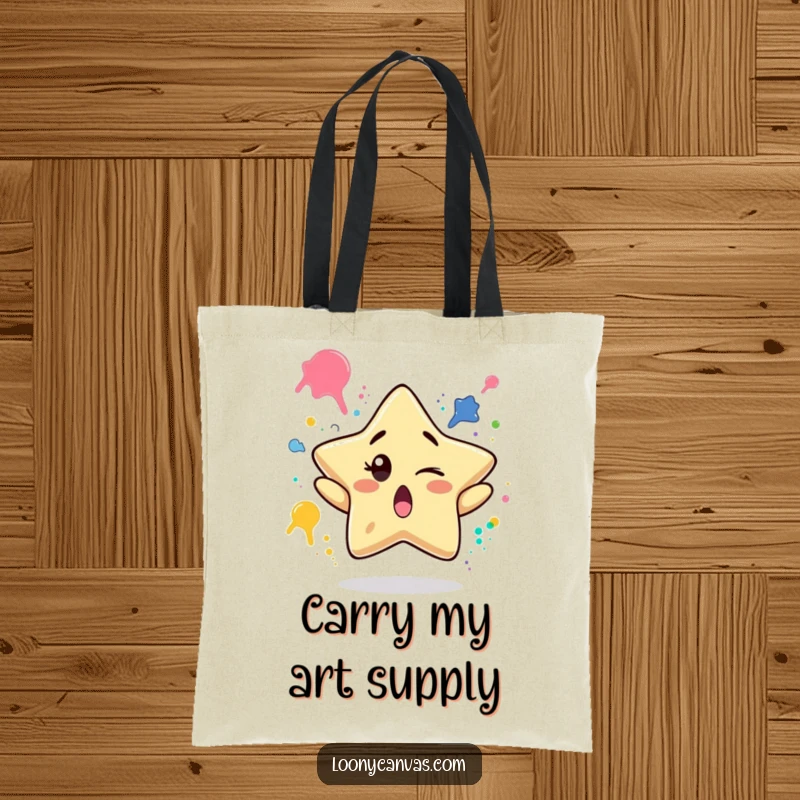 Funny tote bag showcasing a surprised star character winking and juggling paint splatters, perfect for art supplies and humorous style.