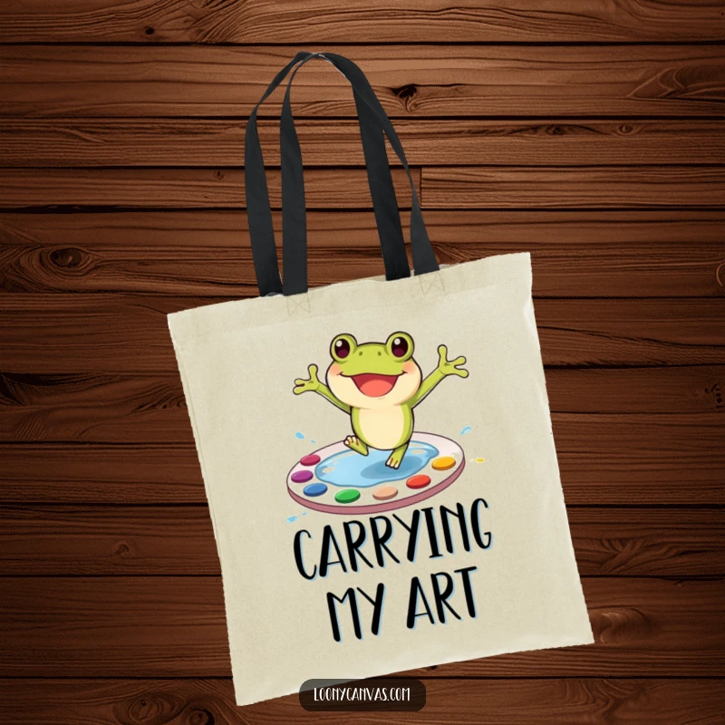 Funny Frog Tote Bag: A cheerful frog character joyfully jumping into a messy, colorful paint palette, ready for art.