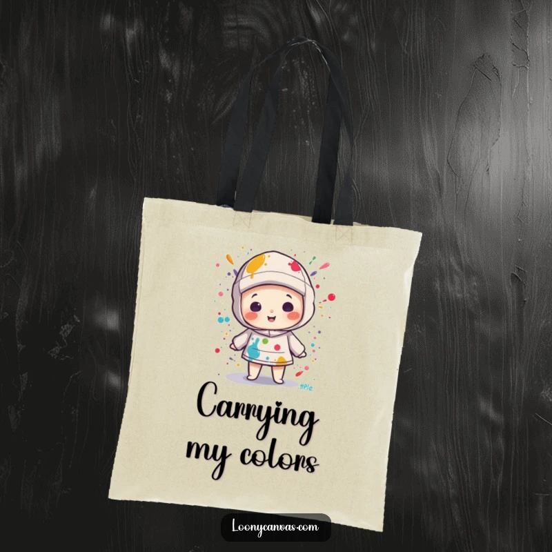 Funny kawaii canvas character splattered with colorful paint on a durable tote bag, perfect for art enthusiasts.