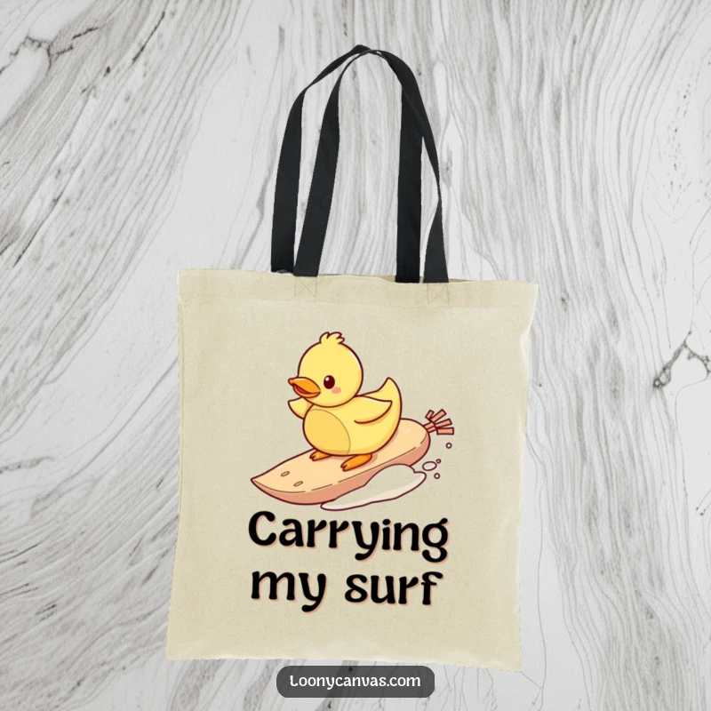 Funny tote bag showcasing a playful rubber ducky surfing on a teabag, perfect for carrying items with whimsical humor.