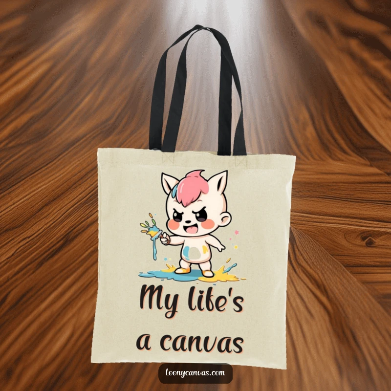 Funny tote bag showcasing a mischievous character gleefully splattering colorful paint, ideal for carrying art supplies.